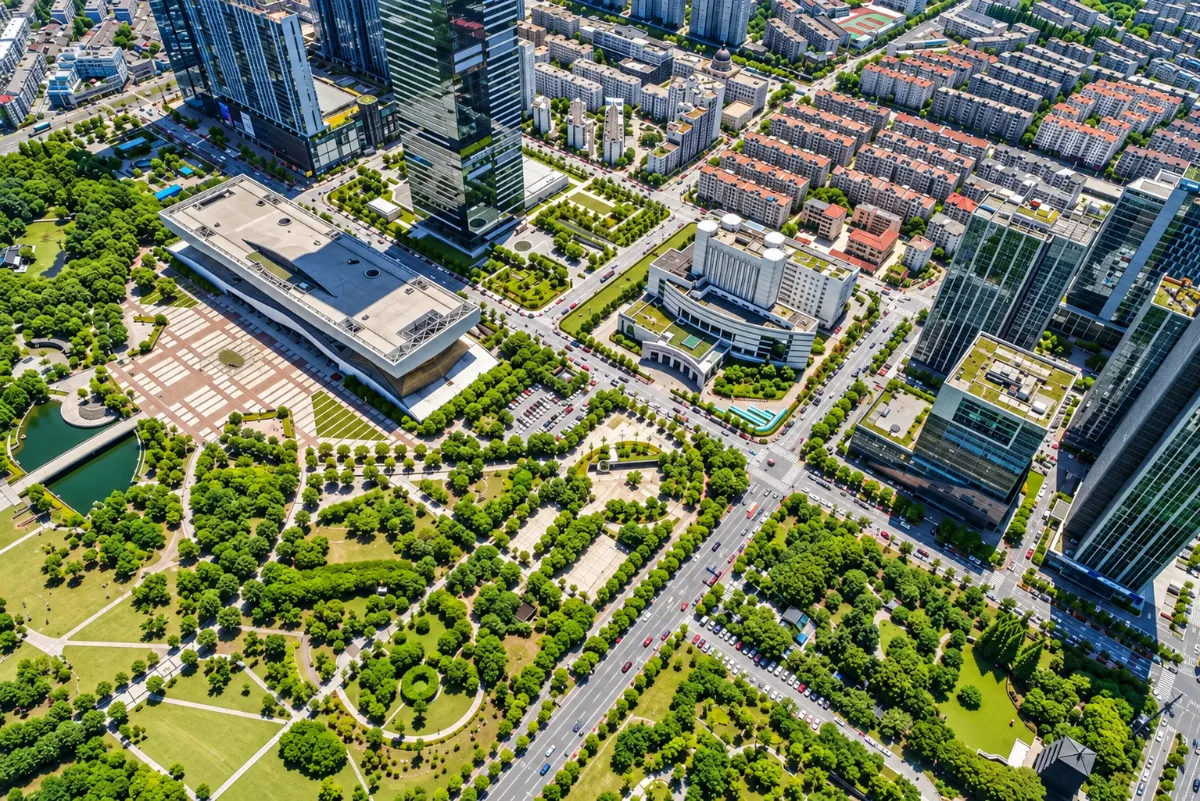 Vue aérienne illustrant un aménagement urbain avec immeubles, espaces verts et voies de circulation